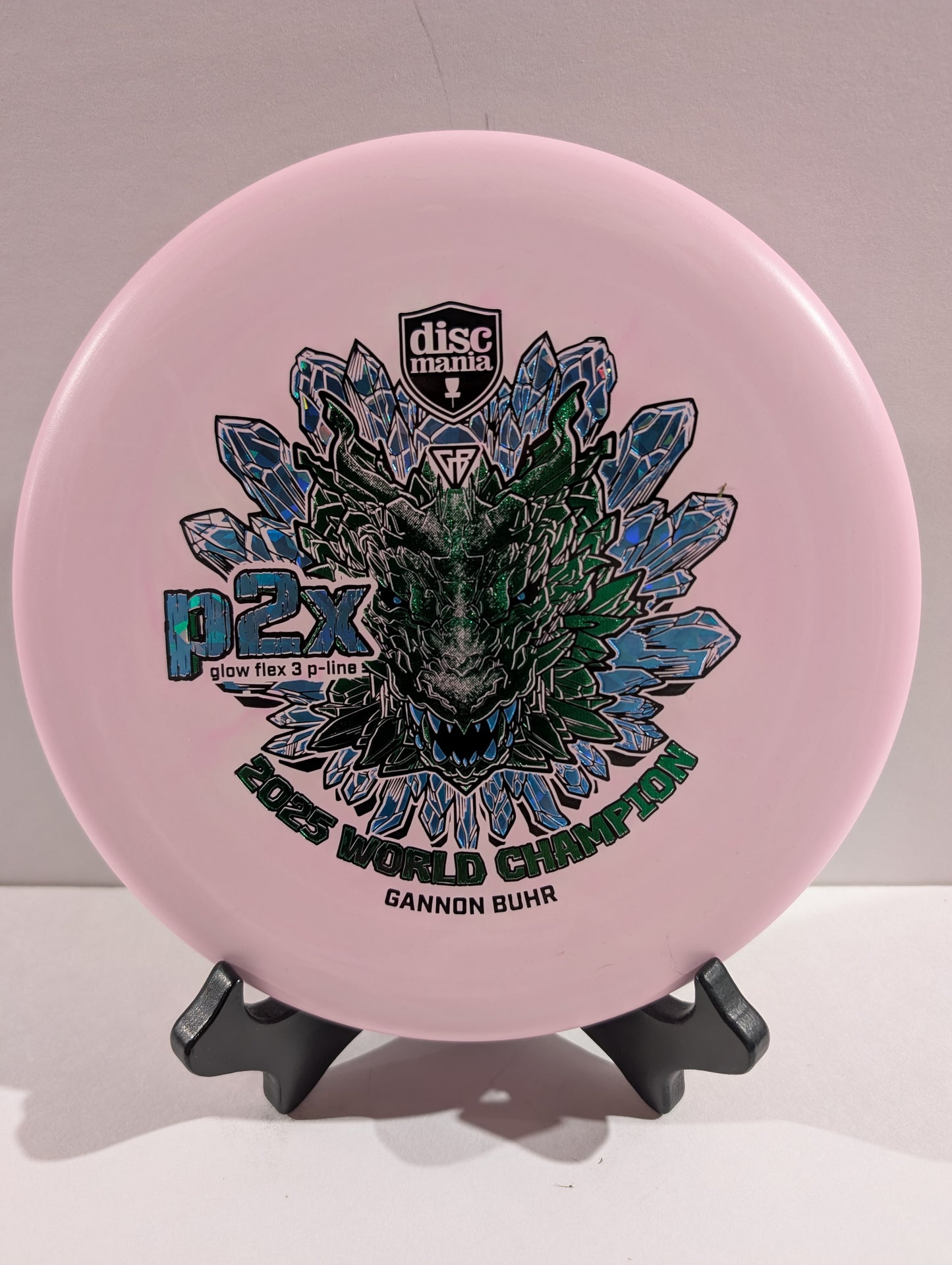 Pink p2x disc with green tricolor dragon stamp