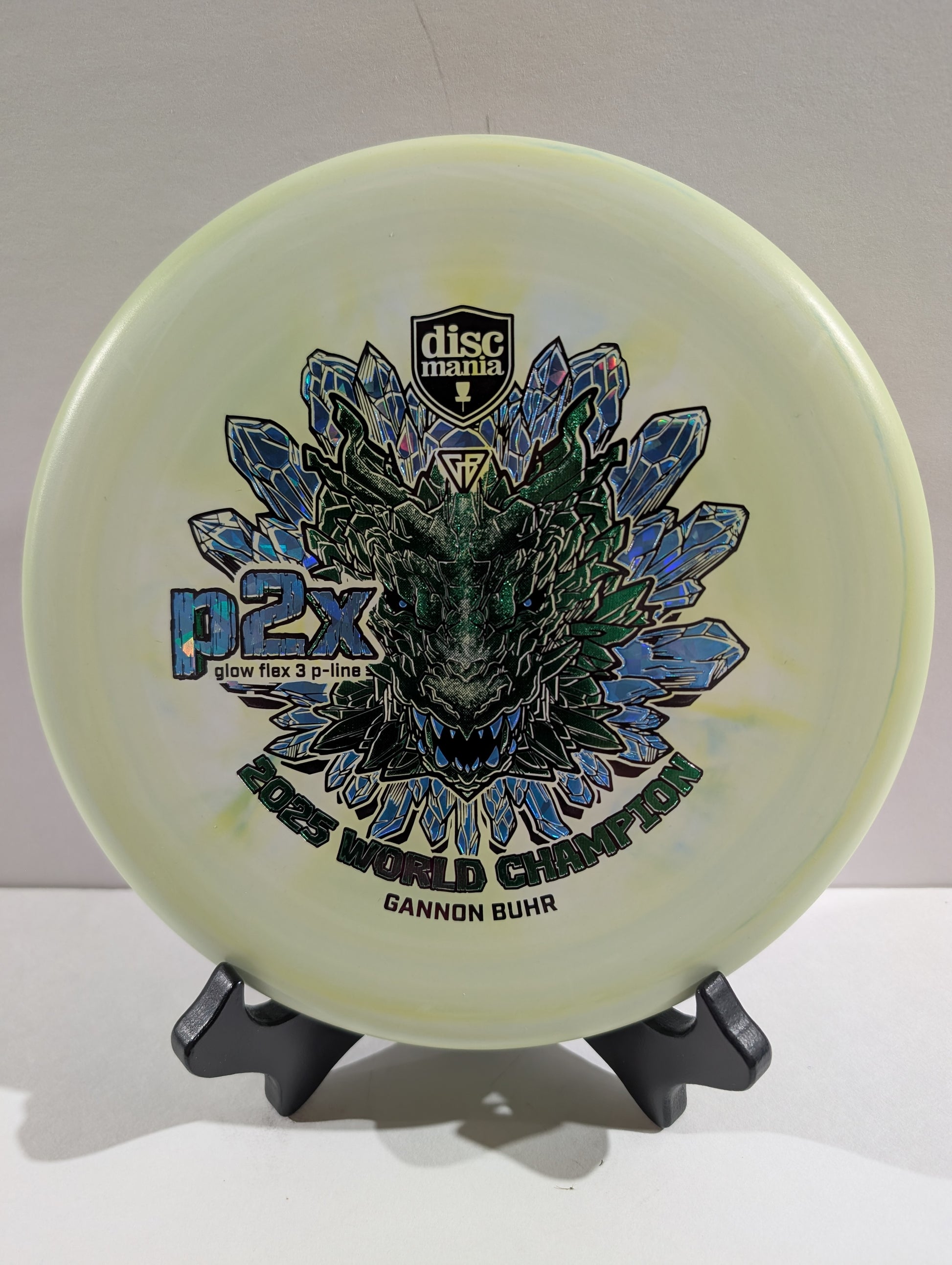 Green p2x disc with green tricolor dragon stamp