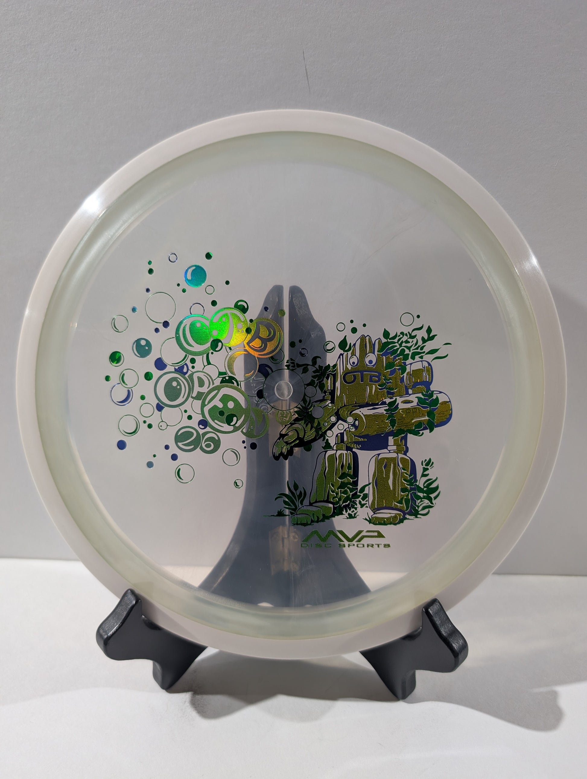 Clear disc with a design on a white background