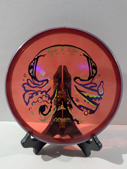 Red disc golf disc with colorful design on a stand against a gray background