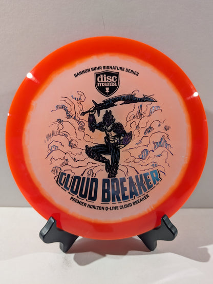 Discmania Cloud Breaker disc golf disc on a stand against a gray background