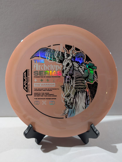 Disc with 'The Archetype Series' branding and warrior design on a stand against a gray background