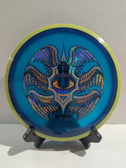 Blue disc with a decorative design on a stand against a white background