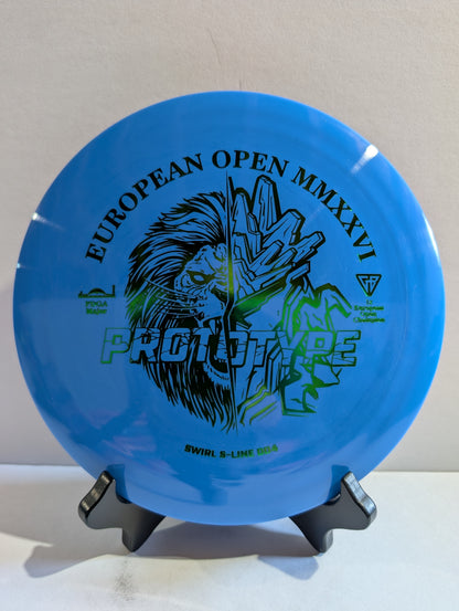 Blue disc golf disc with 'European Open MMXXVI' and 'Prototype' text on a stand.