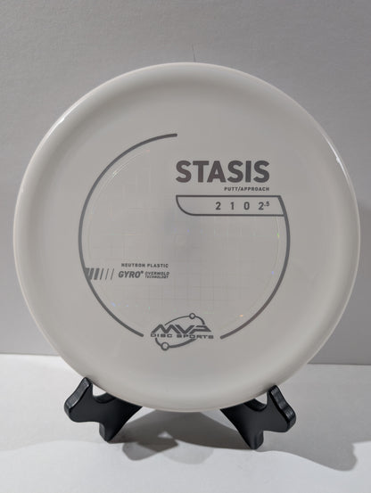 White disc golf putter with 'Stasis' branding on a gray background