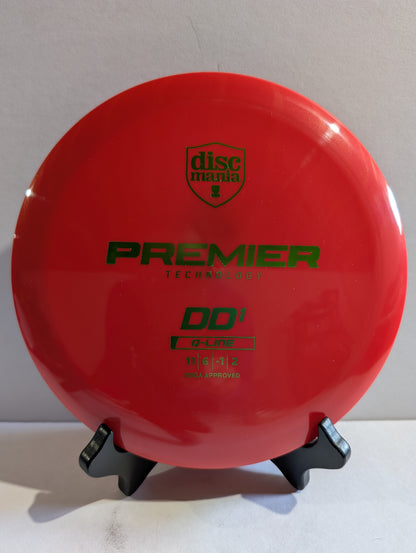 Red disc golf disc with Discmania branding on a white background