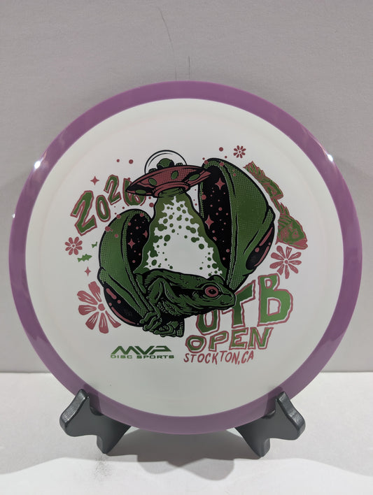 Disc with a green alien design and text on a white background