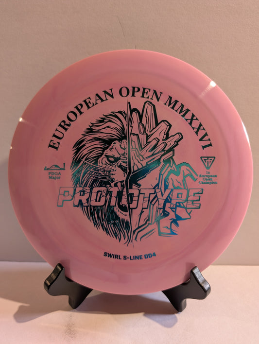 Pink disc golf disc with branding and text on a stand against a beige background