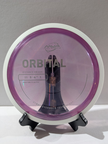 Purple and white disc golf disc on a stand with a gray background