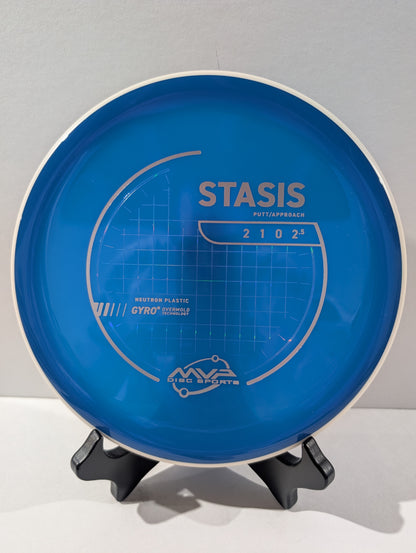Blue disc golf putter with 'Stasis' branding on a gray background