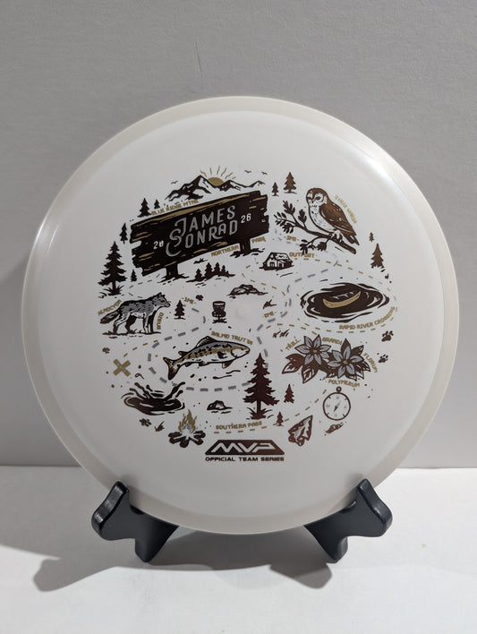 Disc with illustrations and text on a stand against a gray background