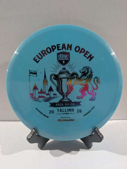 A light blue Discmania European Open disc golf disc displayed on a small black stand against a neutral light gray background.