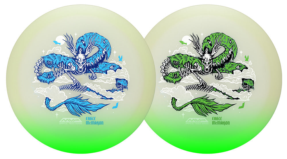 Two disc golf discs with a green-to-white gradient, each featuring a detailed dragon illustration and the text 'EAGLE MCMAHON' at the bottom.